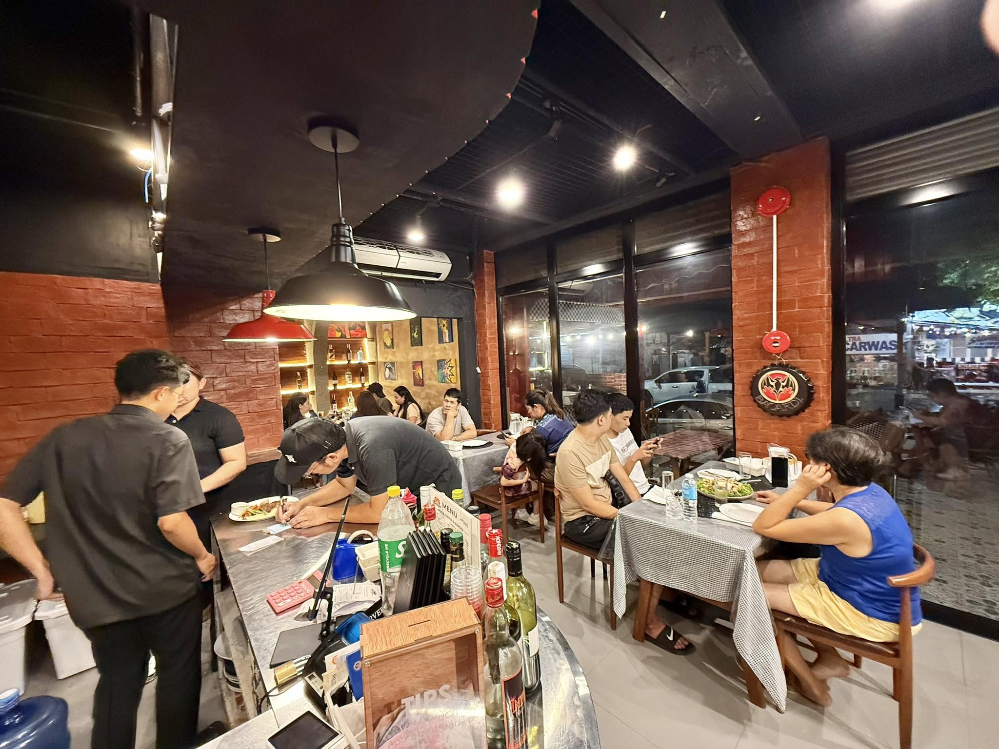 Guests dining inside The American Backyard Gensan