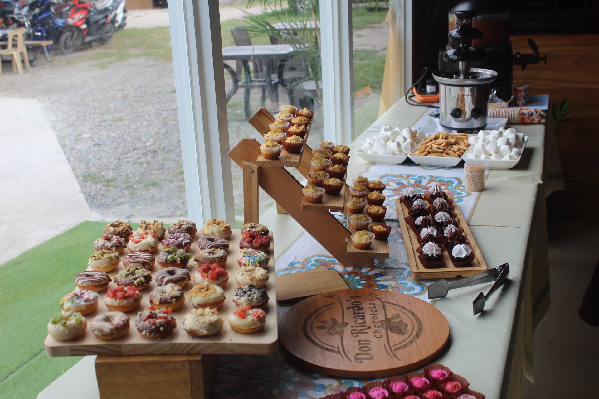 Donuts, cupcakes, marshmallows, and dipping treats set out for visitors