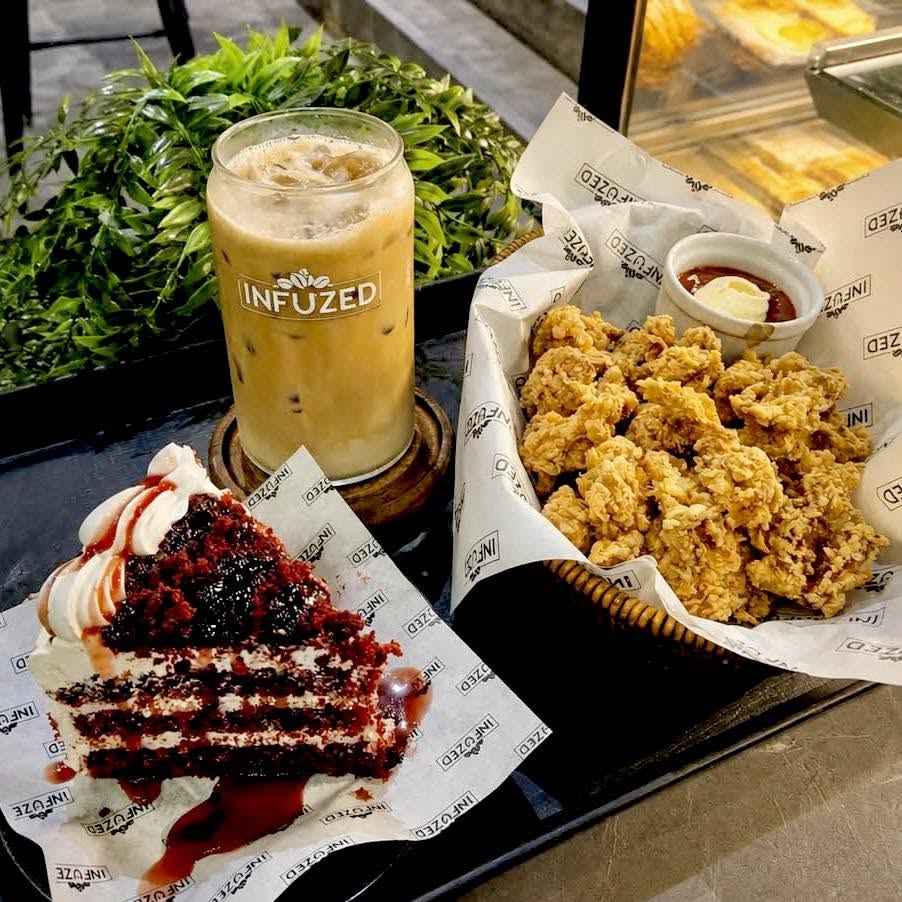 Iced coffee, cake, and crispy bites at Infuzed Cafe Blends