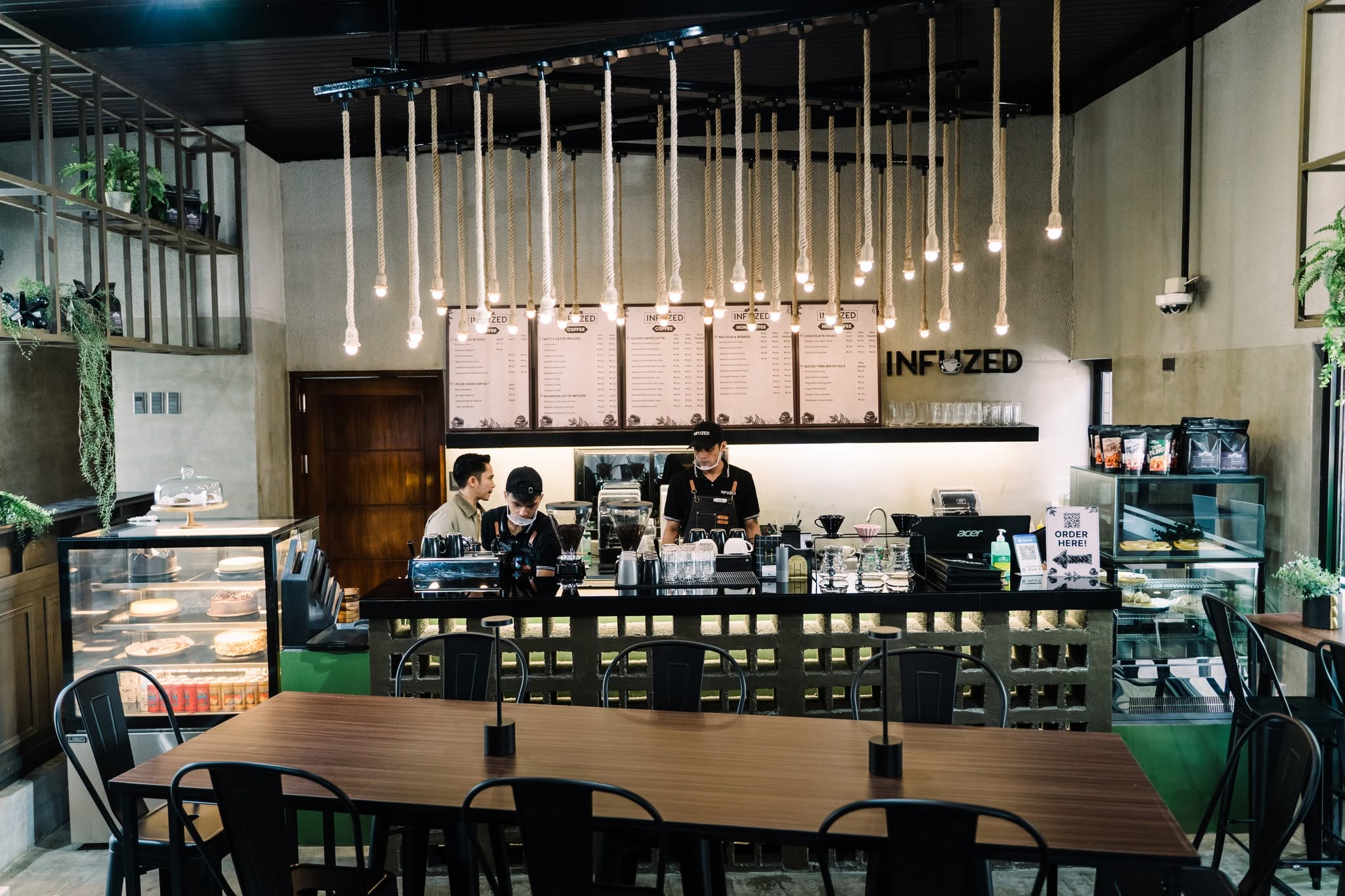 Coffee counter and dining tables at Infuzed Cafe Blends