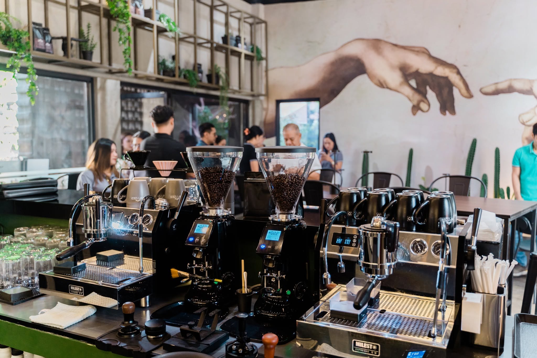 Espresso machines and coffee grinders at Infuzed Cafe Blends