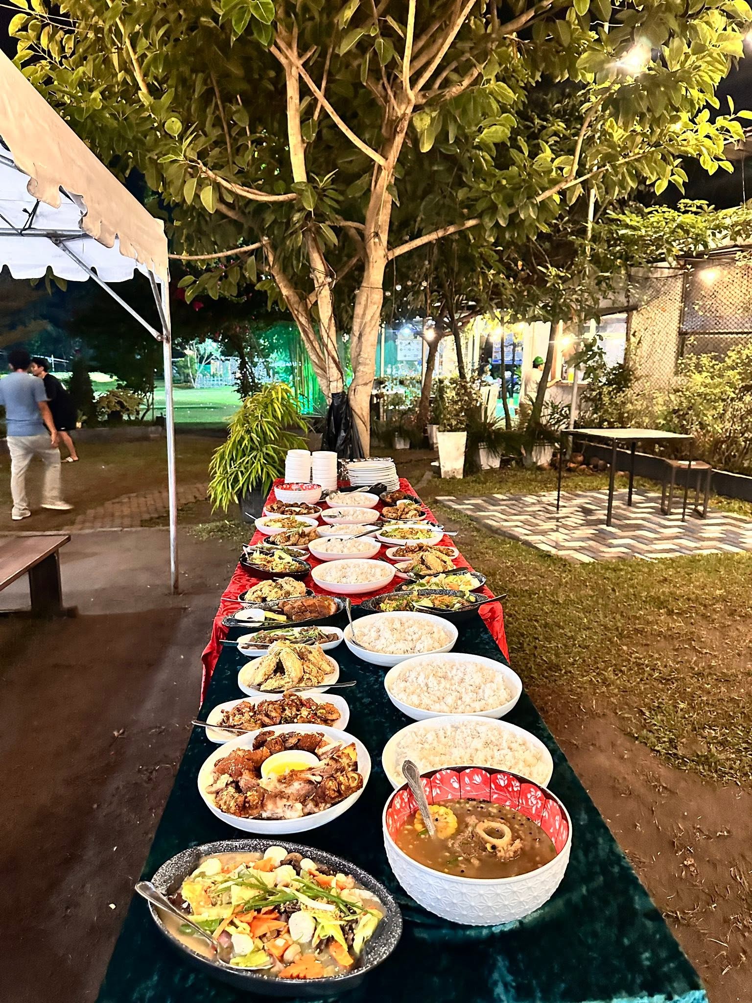 Outdoor buffet table beside the J-Hills range