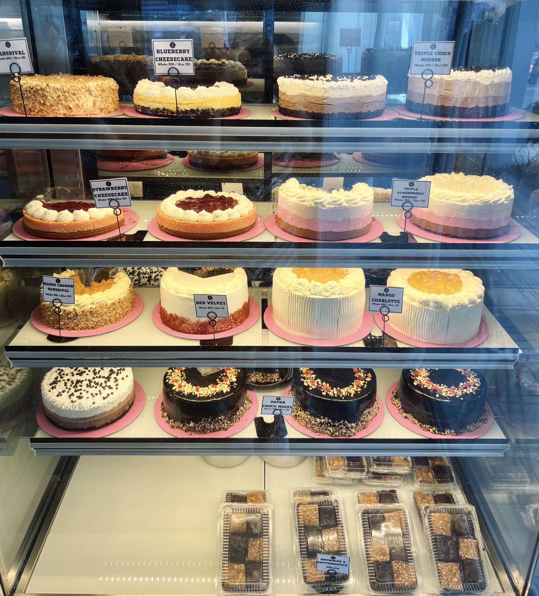 Cake and dessert display at Nikko's Brew
