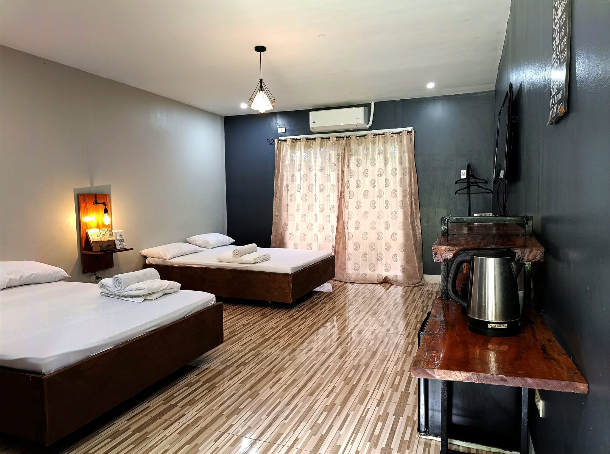 River Ranch Resort guest room with two beds, air conditioning, and room amenities