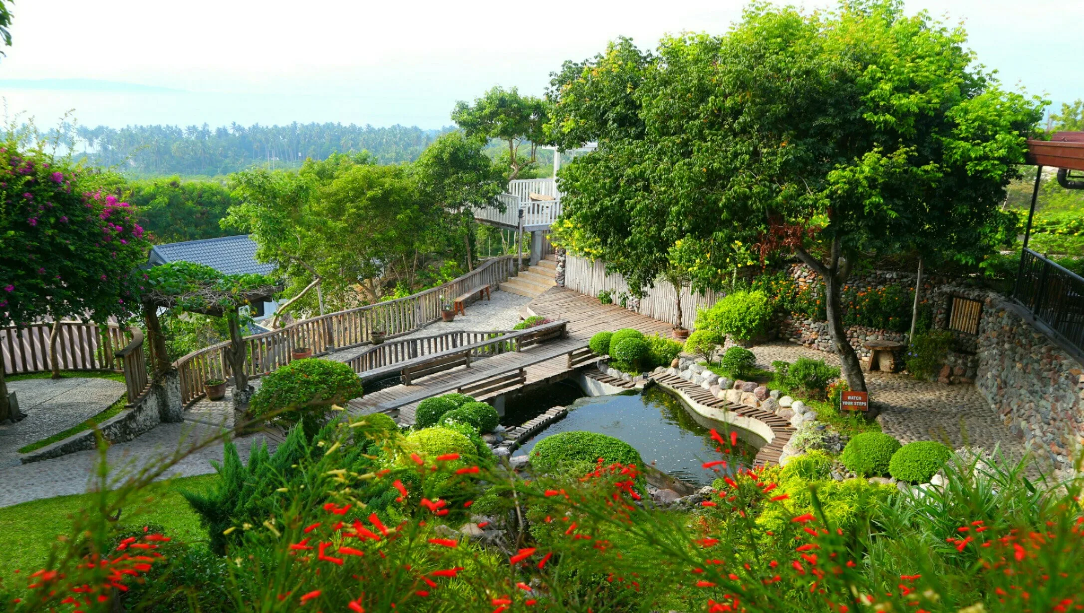 Landscaped garden walkways and pond at Sarangani Highlands Garden in General Santos City