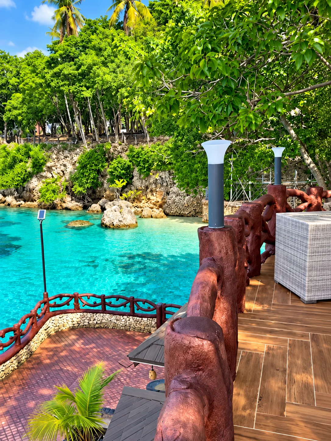 Beachside terrace overlooking the clear coastal waters at Seascape View Resort