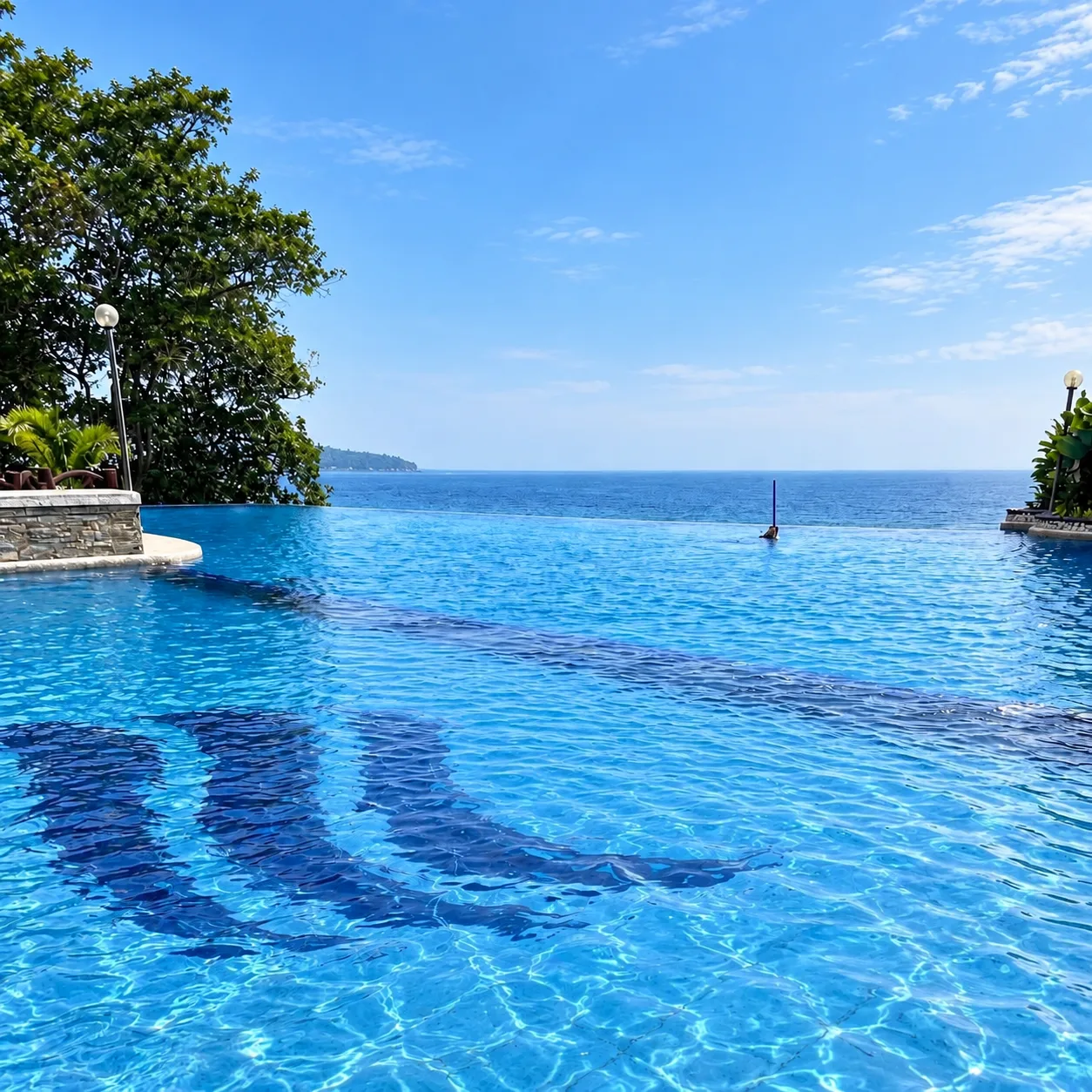 Infinity pool overlooking the sea at Seascape View Resort
